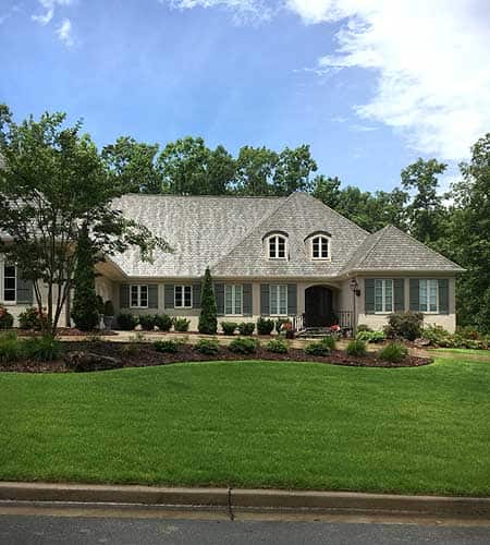 Large home with Zoysiagrass installed