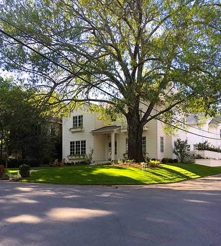 Large residential home with Ezoy ™ Zoysiagrass installed